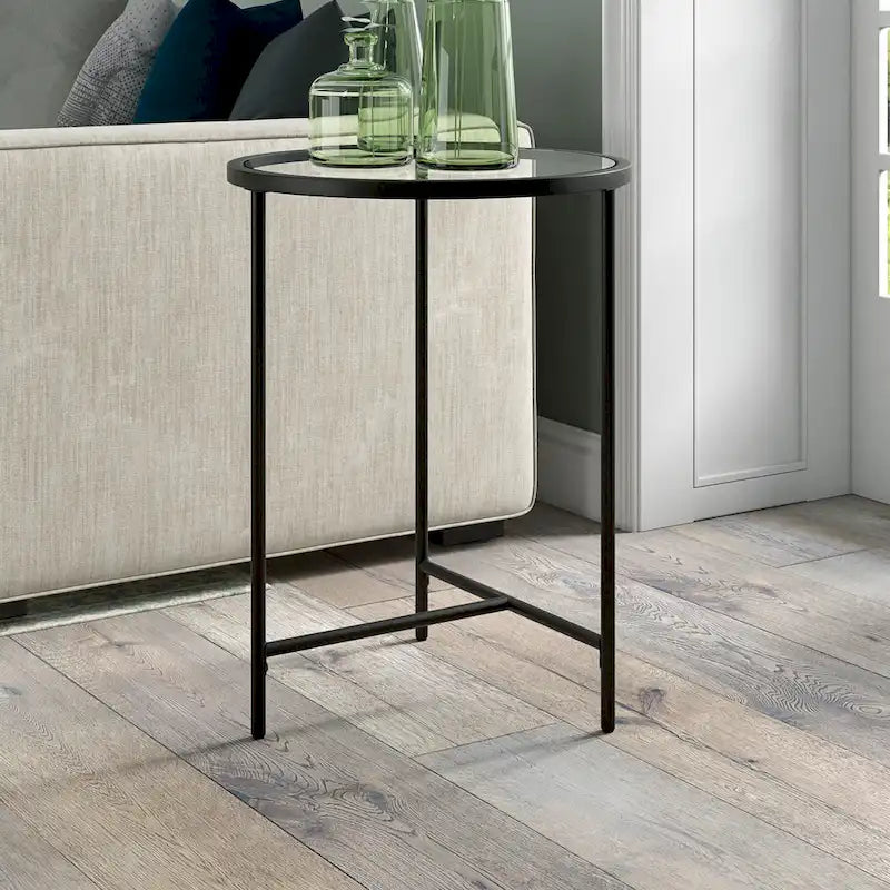 Table d'appoint ronde à plateau en verre et piètement géométrique en acier